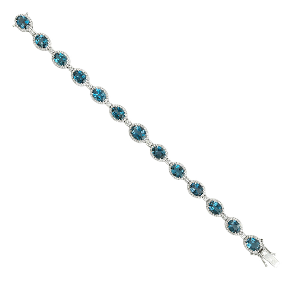 Oval Cut London Blue Topaz Pavé Diamond Fixed and Flexible Bracelet in 14K White Gold
