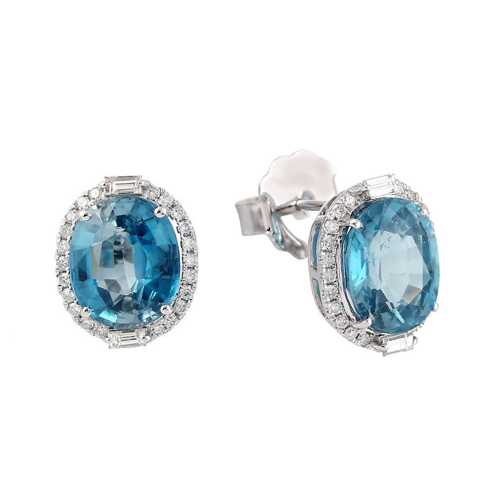 Oval Blue Zirconia & Diamond Halo Stud Earrings in 18K White Gold
