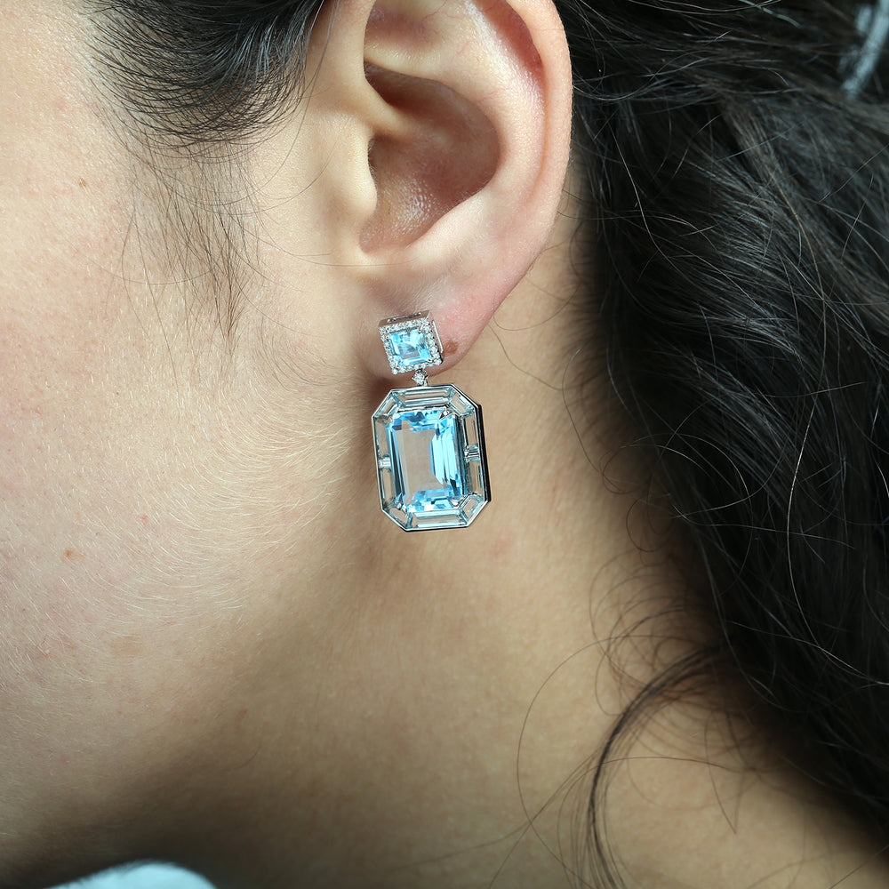 Emerald Cut Blue Topaz and Diamond Drop Earrings in 18K White Gold